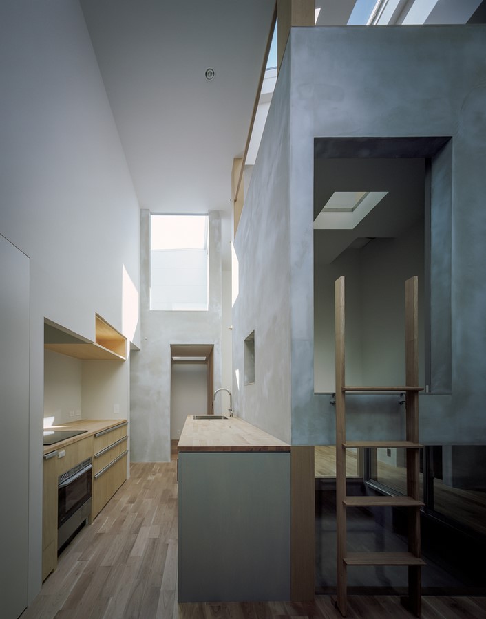 由藤原室建筑师设计的带有光的空洞的房子- Sheet5
